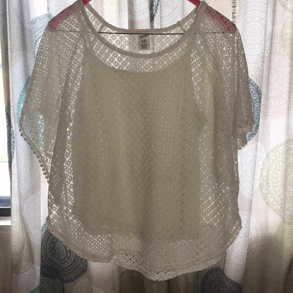 White Tanish Shirt with a tank top underneath